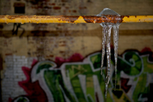 Frozen burst pipe water damage home